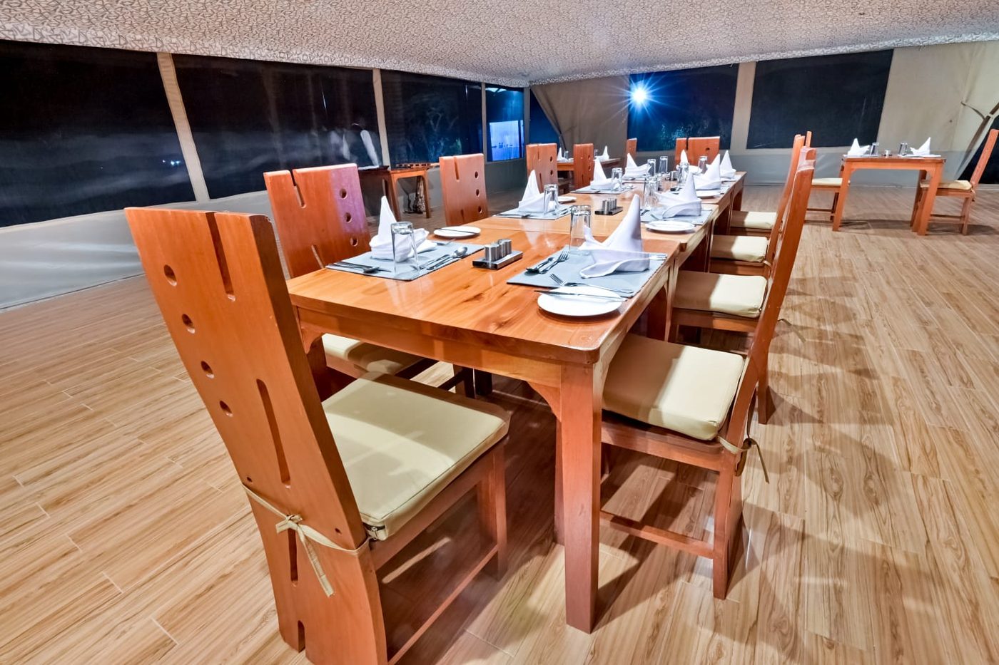 Dining table set under canvas